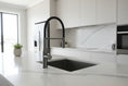 Load image into Gallery viewer, Black kitchen faucet on a white background