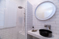 Load image into Gallery viewer, ESPERIA brushed nickel spout mixer in a white-tiled bathroom