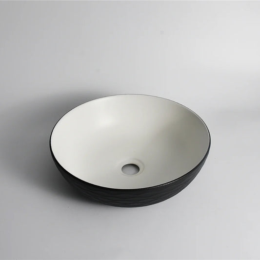 CLAYA polar wavy 40 round ceramic above counter basin textured matte black