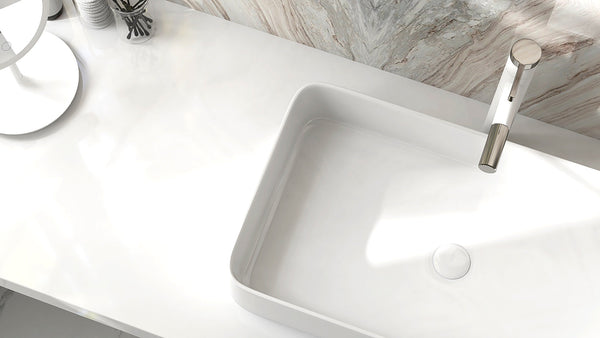 Bathroom basin and tap matched for comfortable reach and water flow