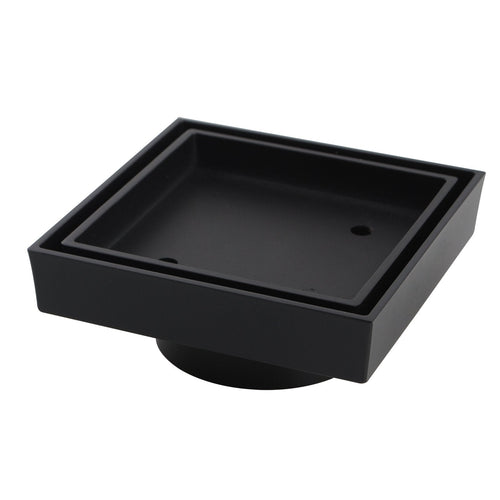 Square floor waste drain in a brushed metal finish