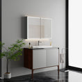 Load image into Gallery viewer, LED mirror cabinet above a bathroom vanity
