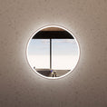 Load image into Gallery viewer, Brushed copper round LED bathroom mirror in a bathroom setting
