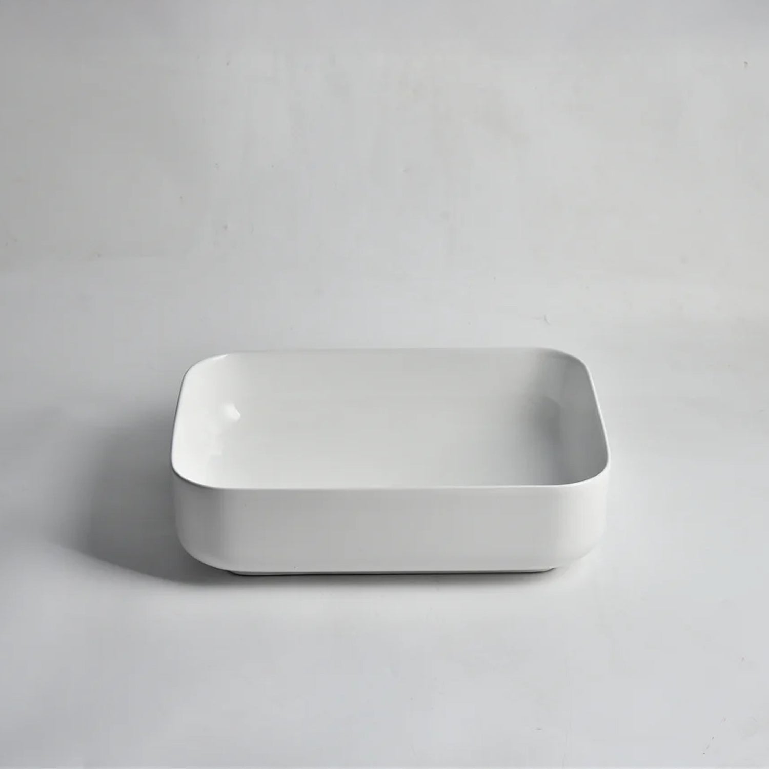 CLAYA Oval-50 Oval Ceramic Above Counter Basin – 500mm Gloss White