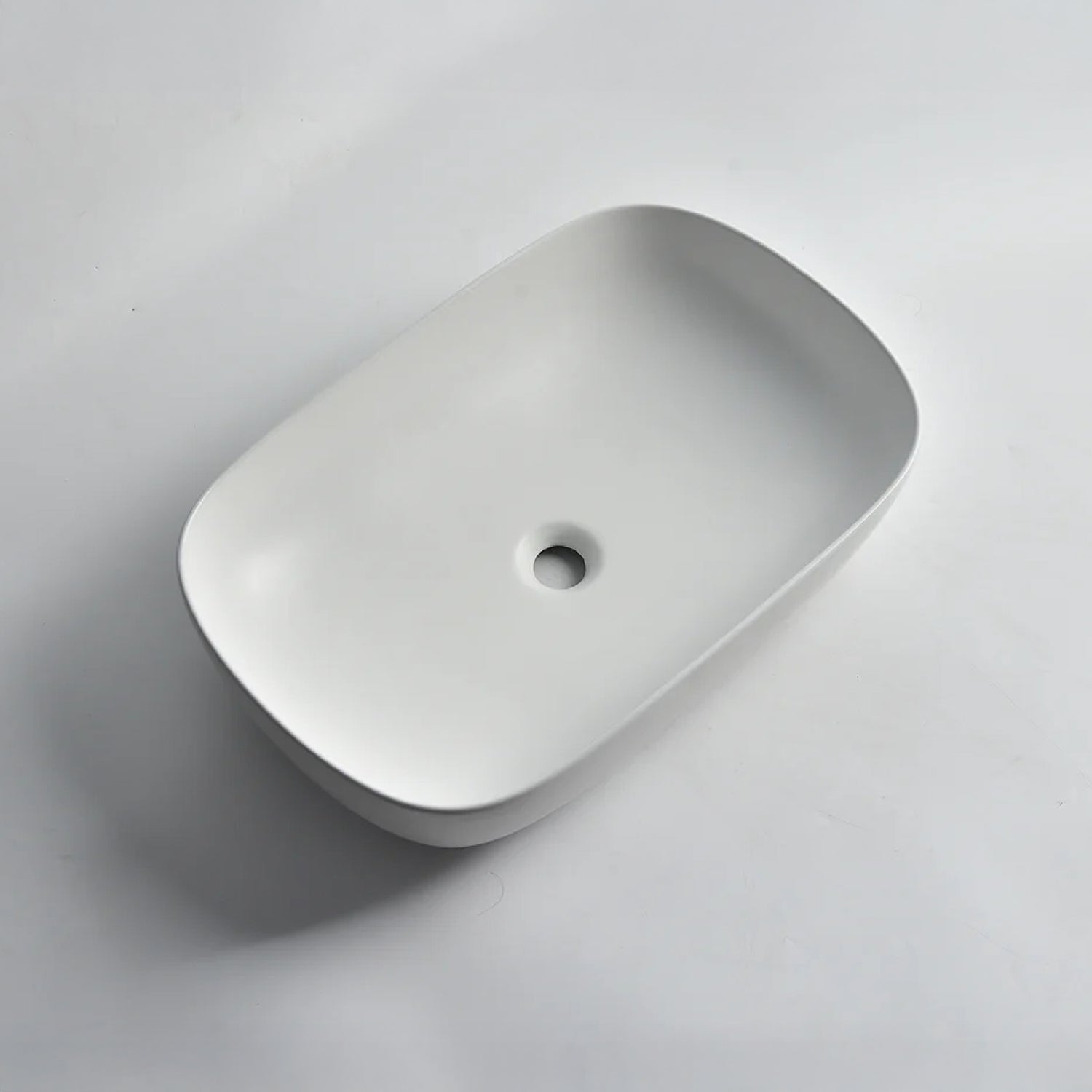 CLAYA Oval-60 Oval Ceramic Above Counter Basin – 610mm Matte White