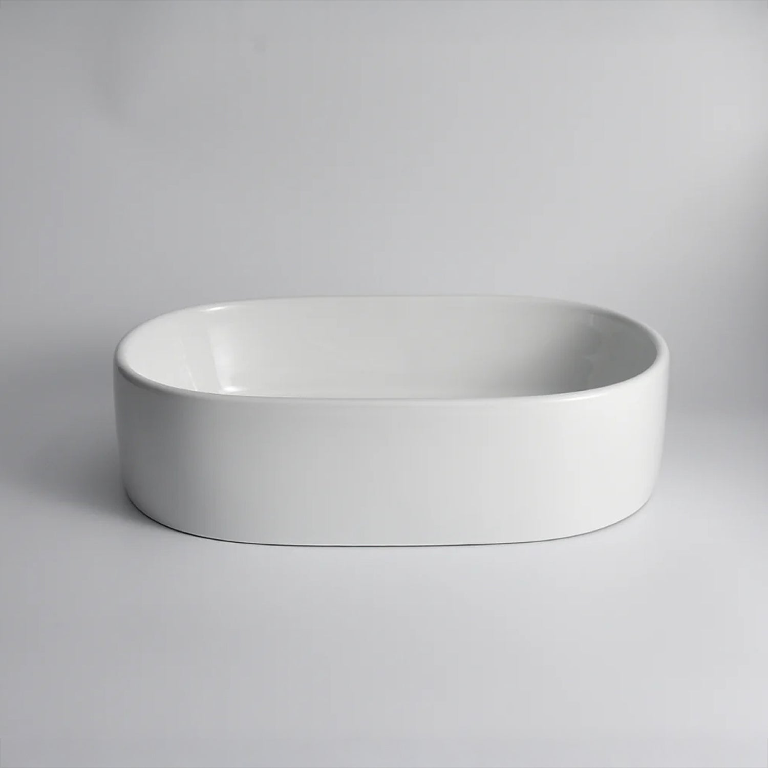 CLAYA Pill-56 Ceramic 560mm Above Counter Basin – Gloss White