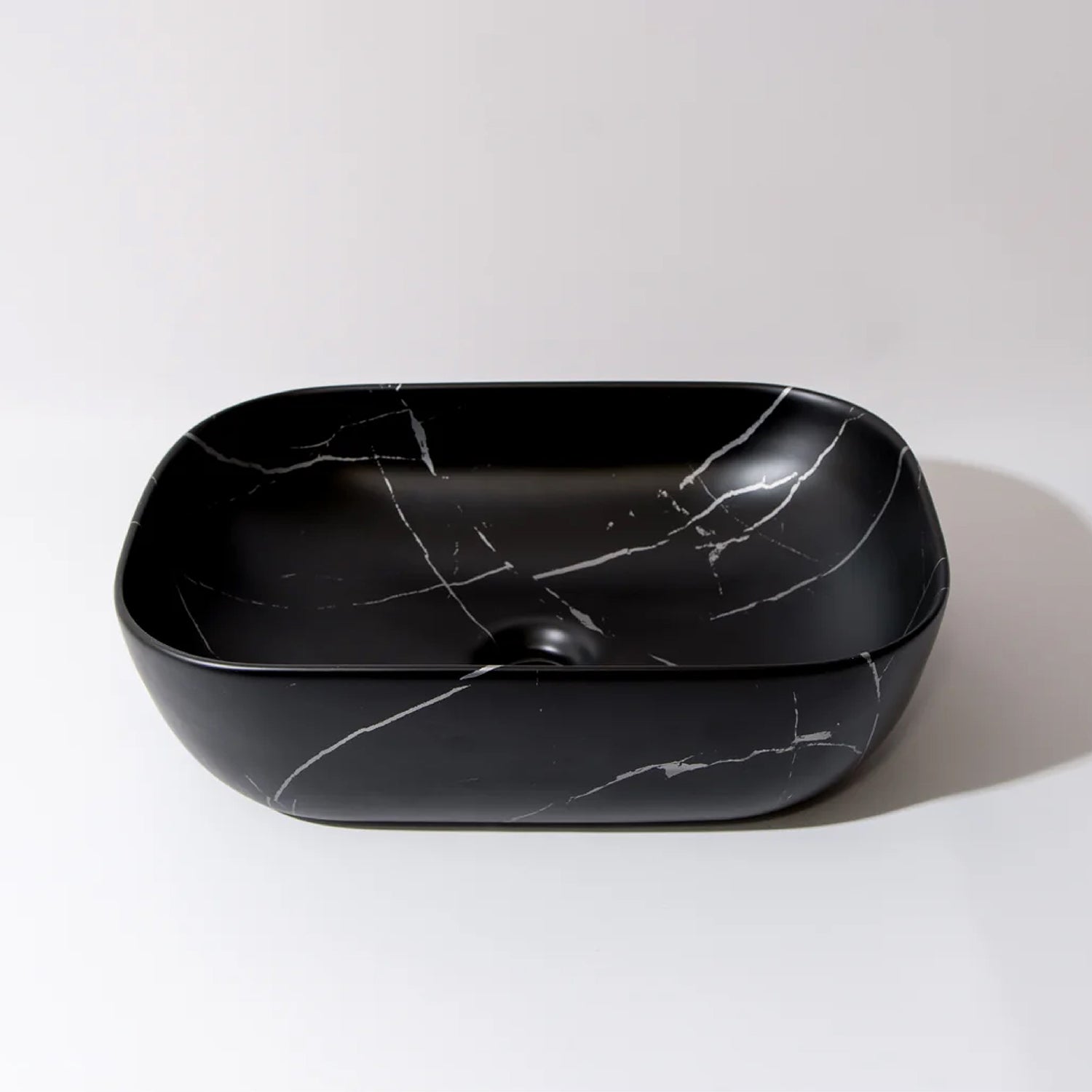 CLAYA Fusion-46 above counter basin in matte black Carrara finish. Durable fine ceramic basin with oval design and 32mm non-overflow waste for modern bathrooms.-Basin Sink-Ezymall AU