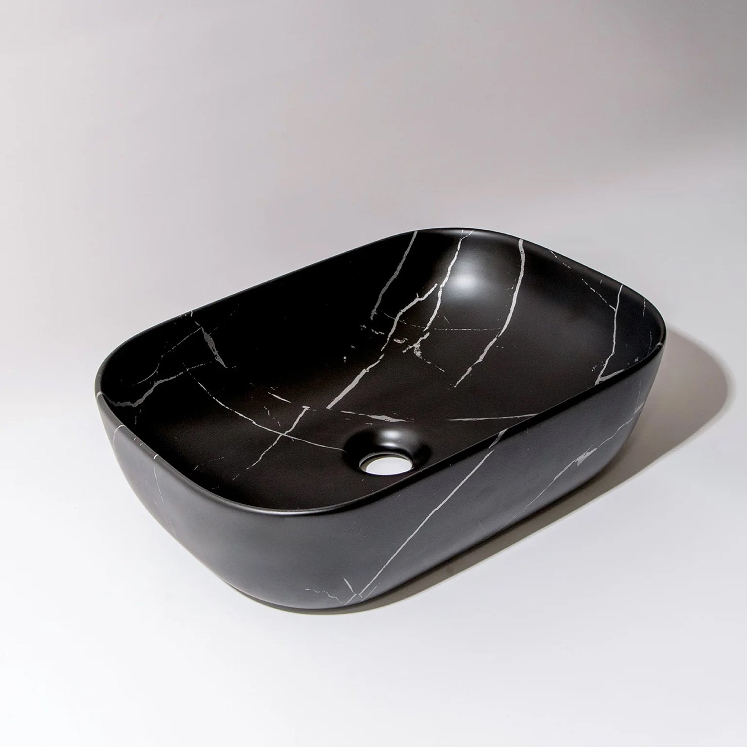 CLAYA Fusion-46 above counter basin in matte black Carrara finish. Durable fine ceramic basin with oval design and 32mm non-overflow waste for modern bathrooms.-Basin Sink-Ezymall AU