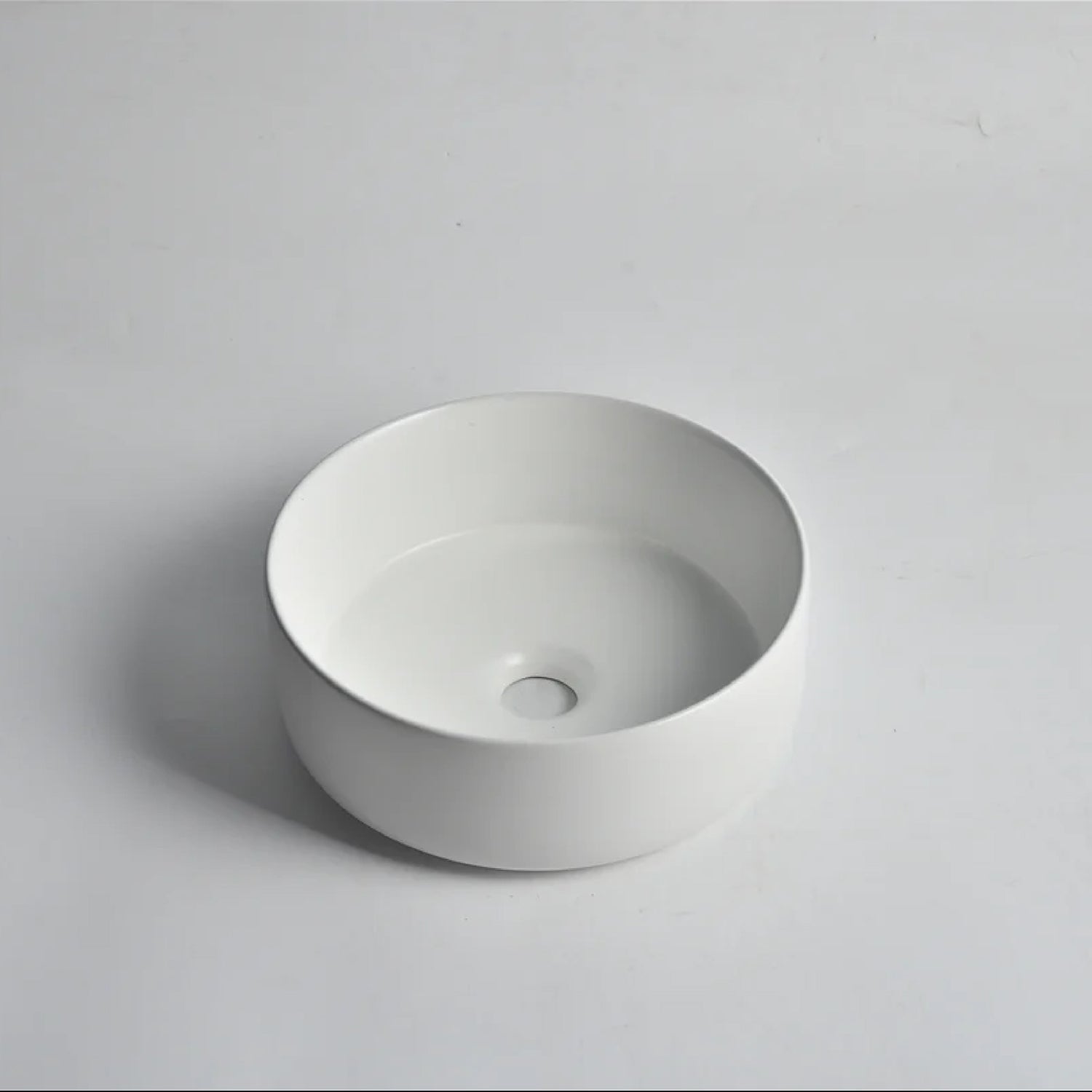 CLAYA Mini-30 above counter basin in matte white ceramic. 300mm compact round basin ideal for small bathrooms and powder rooms.-Basin Sink-Ezymall AU