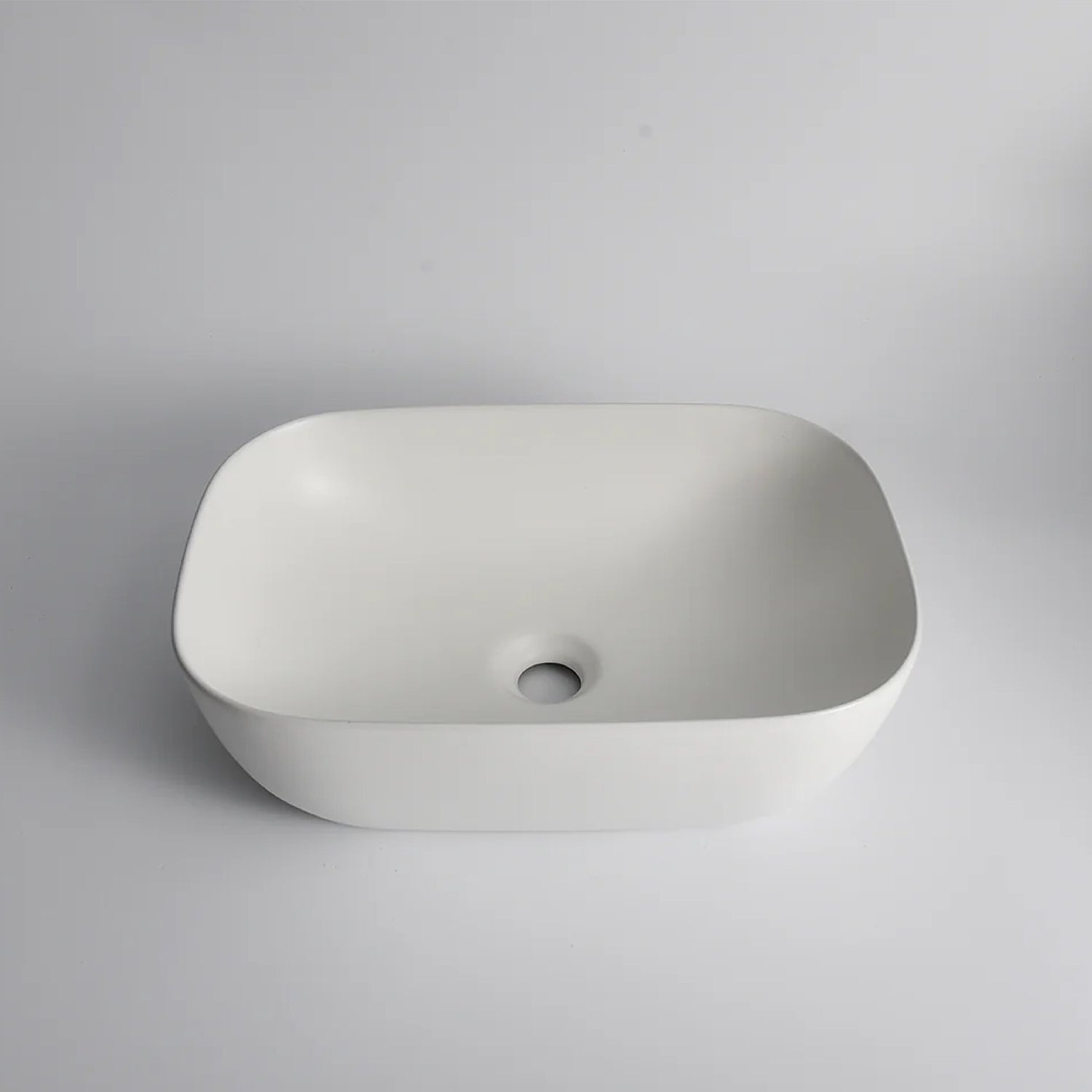 CLAYA Oval-46 above counter basin in matte white ceramic. 460mm oval basin with non-overflow waste, ideal for modern bathroom vanities.-Basin Sink-Ezymall AU