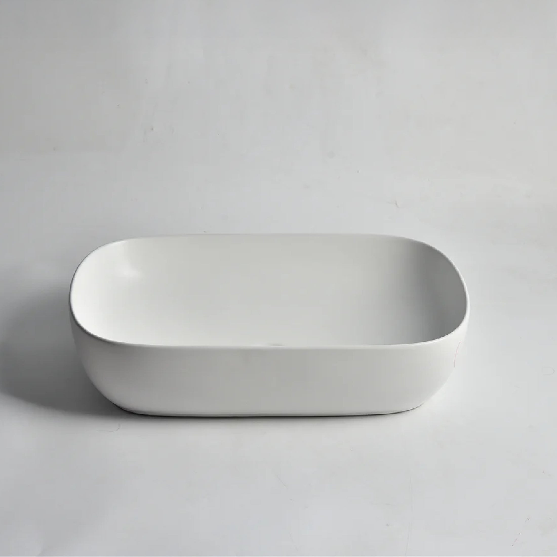CLAYA Oval-60 above counter basin in gloss white ceramic. Large 610mm oval basin with non-overflow waste for modern bathroom vanities.-Basin Sink-Ezymall AU