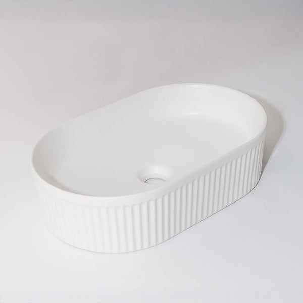CLAYA Pill-49 fluted above counter basin in matte white ceramic. 490mm oval basin with vertical fluting and overflow for modern bathrooms.-Basin Sink-Ezymall AU
