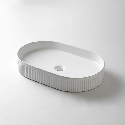 CLAYA pill 58 fluted ceramic 580mm above counter basin matte white