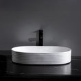 Load image into Gallery viewer, CLAYA Pill-60 fluted above counter basin in matte white ceramic. 605mm oval basin with non-overflow waste for modern bathroom vanities.-Basin Sink-Ezymall AU
