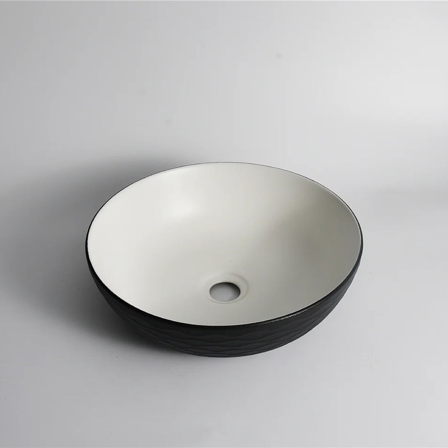 CLAYA Polar-Wavy-40 basin with textured matte black finish. 400mm round ceramic basin for modern bathroom spaces.-Basin Sink-Ezymall AU