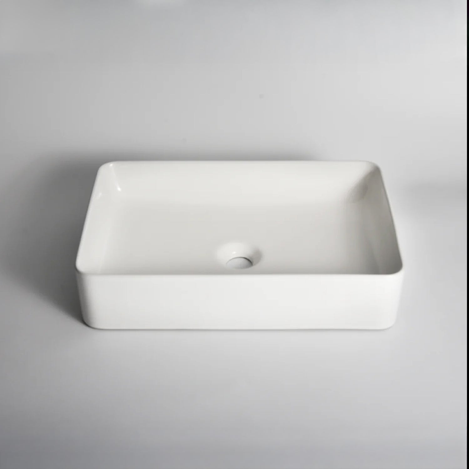 CLAYA RT-5033 above counter basin in gloss white ceramic. 500mm rectangular basin with low profile for modern bathrooms.-Basin Sink-Ezymall AU