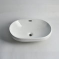 Load image into Gallery viewer, CLAYA SEMI-60 semi-inset basin in gloss white ceramic. 605mm oval basin ideal for modern and family bathroom vanities.-Basin Sink-Ezymall AU
