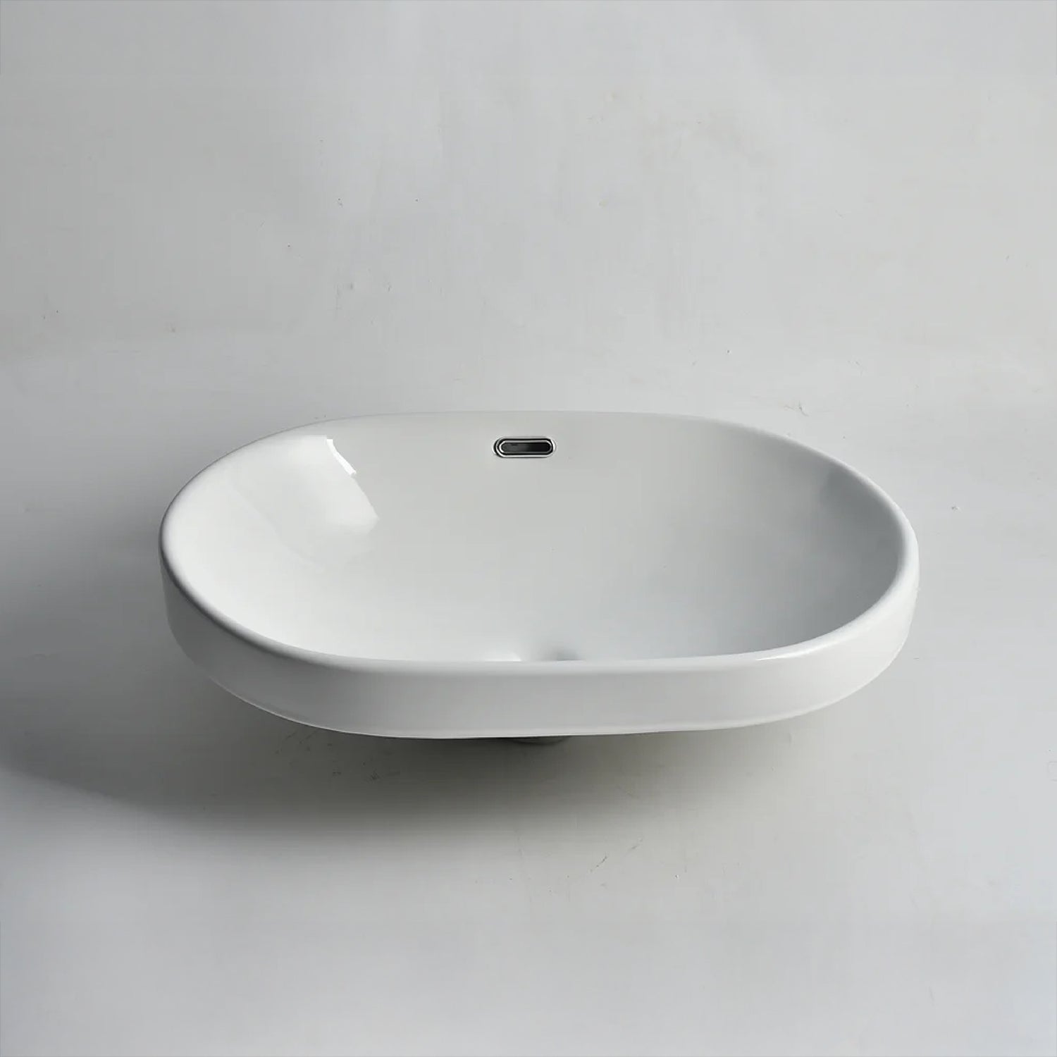 CLAYA SEMI-60 semi-inset basin in gloss white ceramic. 605mm oval basin ideal for modern and family bathroom vanities.-Basin Sink-Ezymall AU