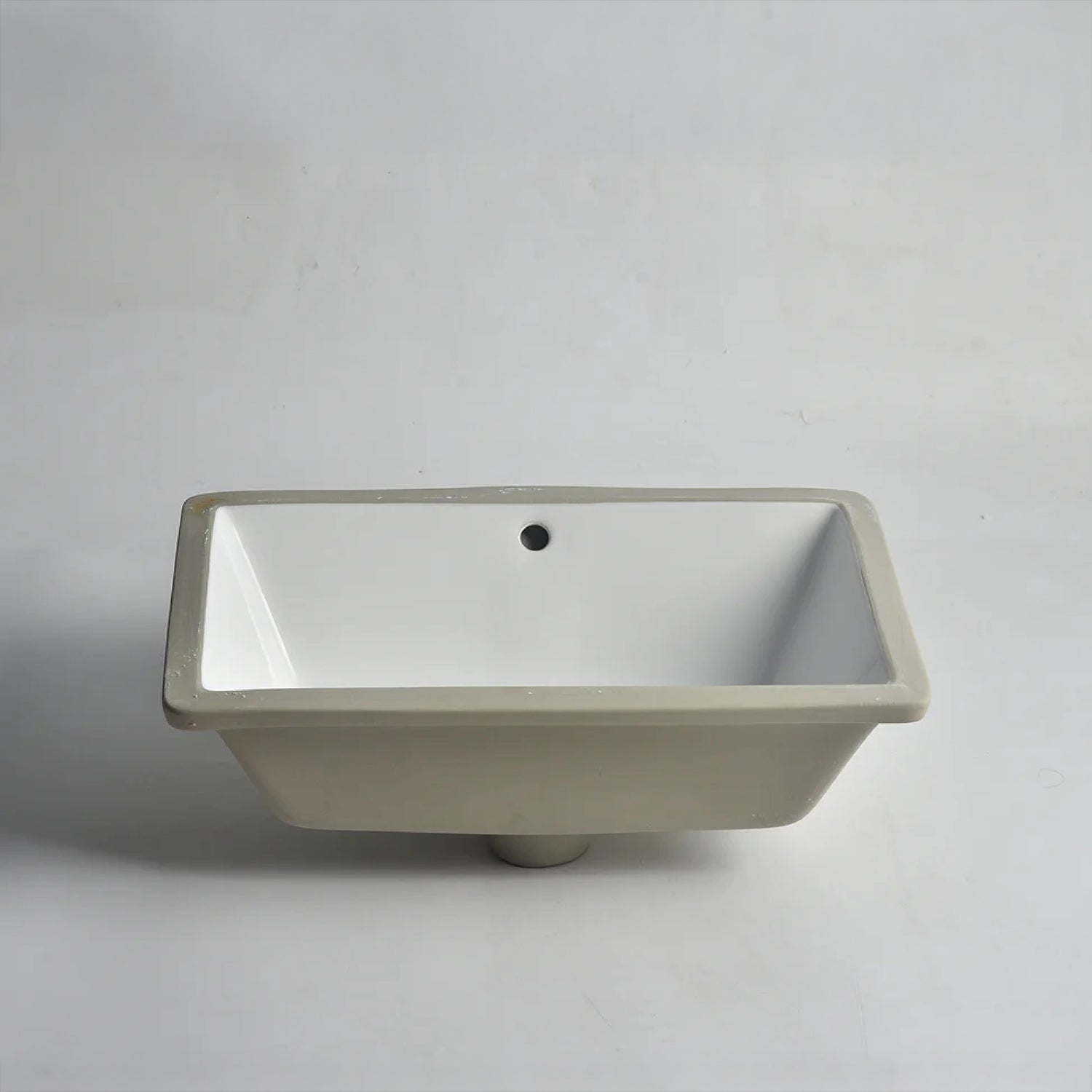 CLAYA UM-5334 under counter basin in gloss white ceramic. 530mm undermount basin with overflow for modern bathroom vanities.-Basin Sink-Ezymall AU