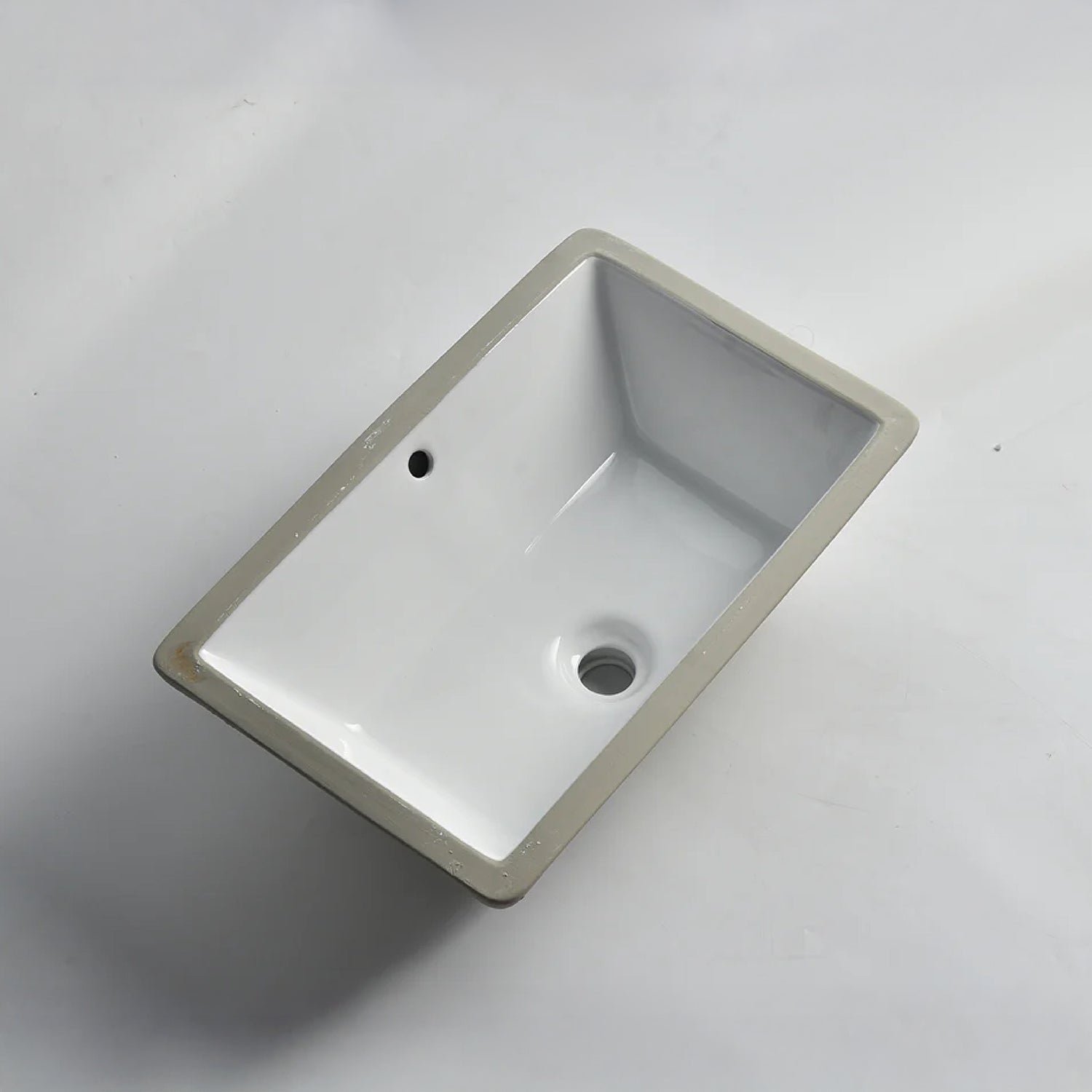 CLAYA UM-5334 under counter basin in gloss white ceramic. 530mm undermount basin with overflow for modern bathroom vanities.-Basin Sink-Ezymall AU