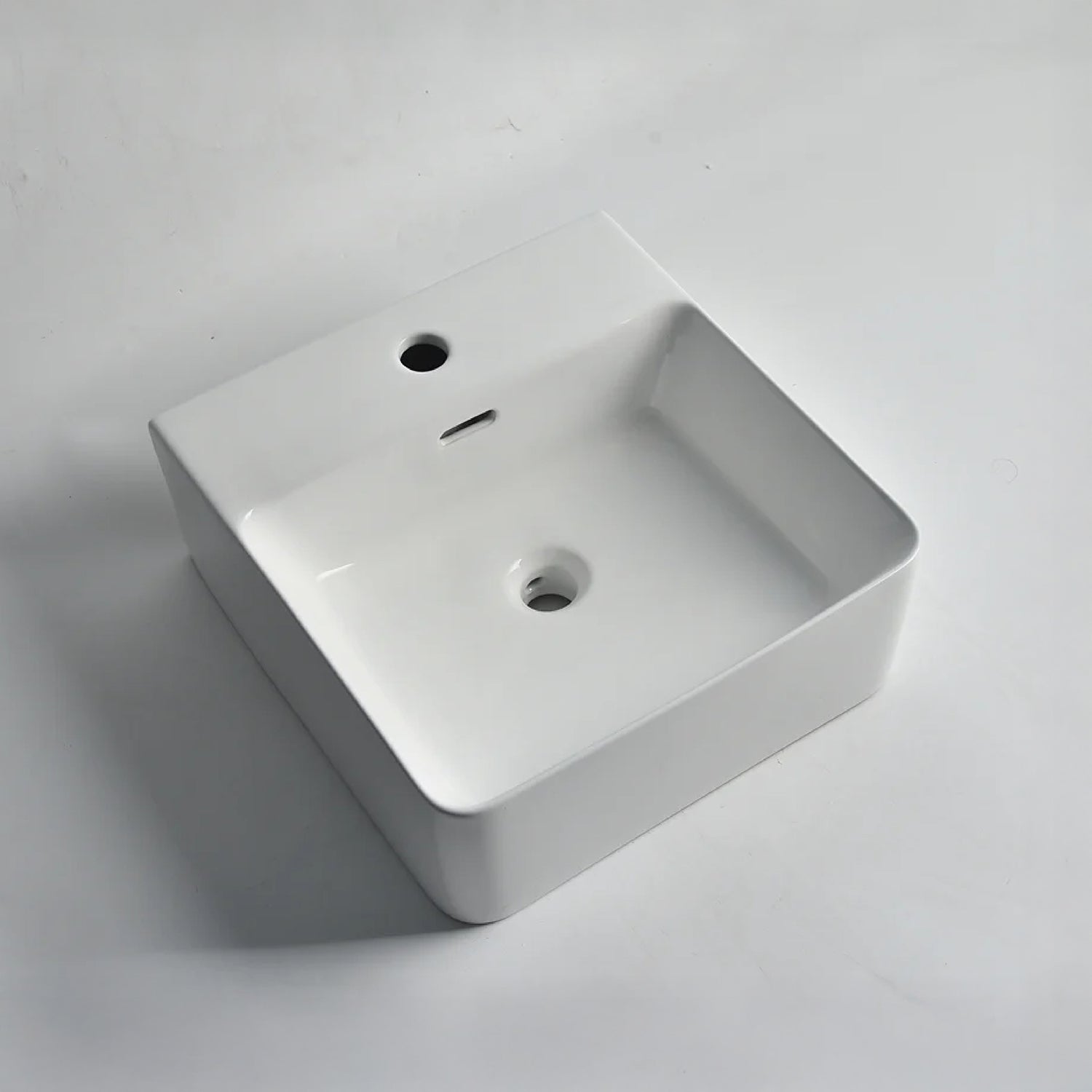 CLAYA WH-42 basin in gloss white ceramic. 420mm basin suitable for wall hung or above counter installation with overflow design.-Basin Sink-Ezymall AU