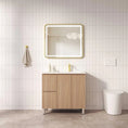 Load image into Gallery viewer, Upgrade your bathroom with the RITA 880mm Freestanding Vanity. Elegant Oak finish, 2 doors, 2 drawers and premium top options available.-Vanity-Left Hand Drawers-Cabinet Only-Legs-Ezymall AU

